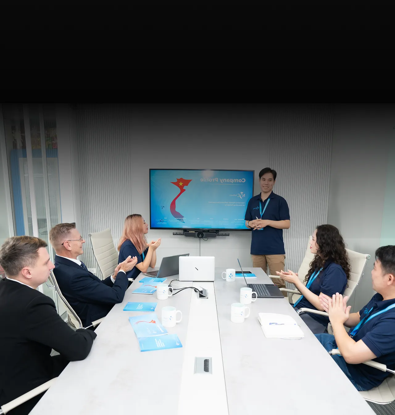NSC senior engineers collaborating in a modern office