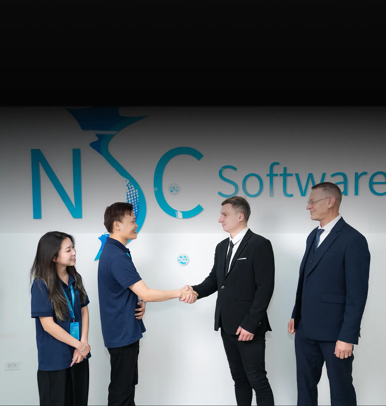 NSC senior engineers collaborating in a modern office